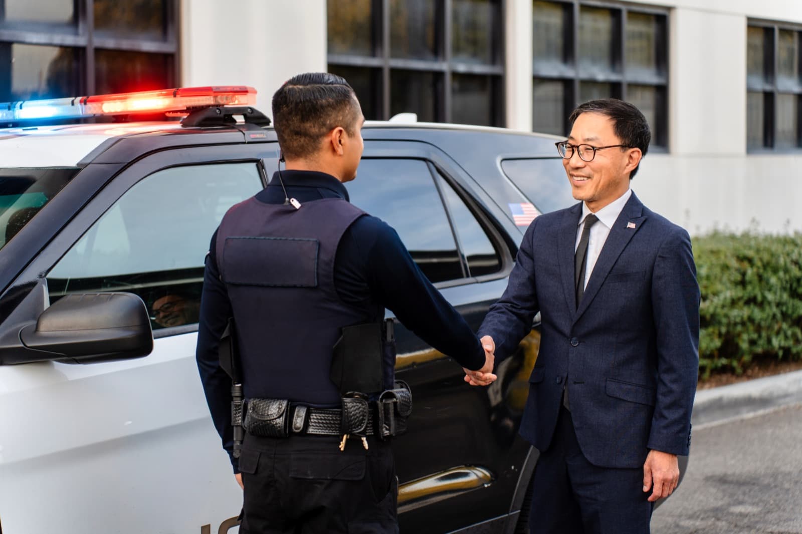Fred Jung meeting with local law enforcement officers