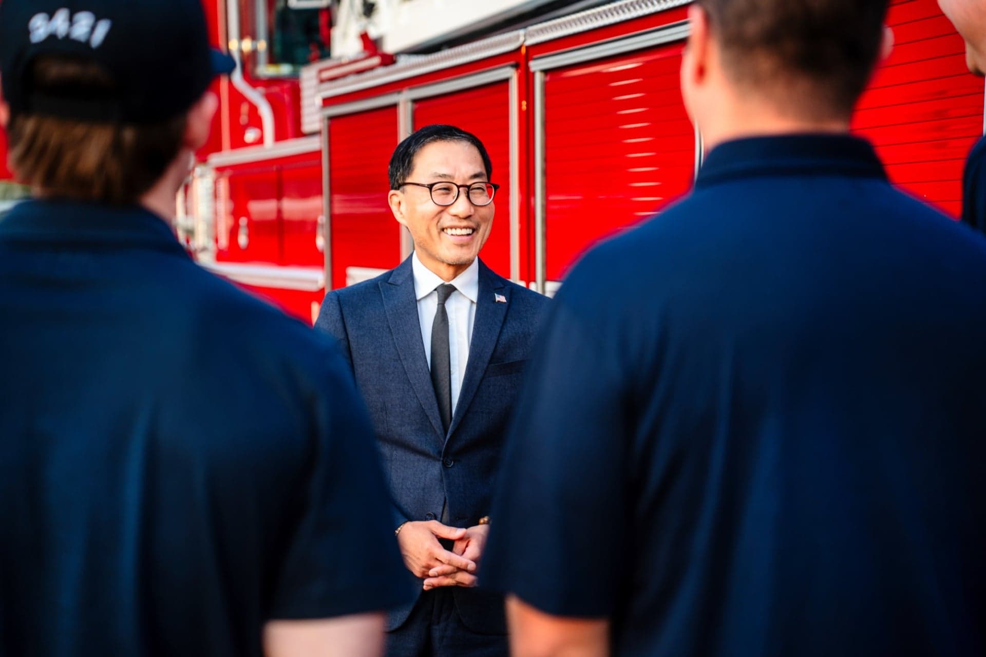Fred Jung speaking with firefighters