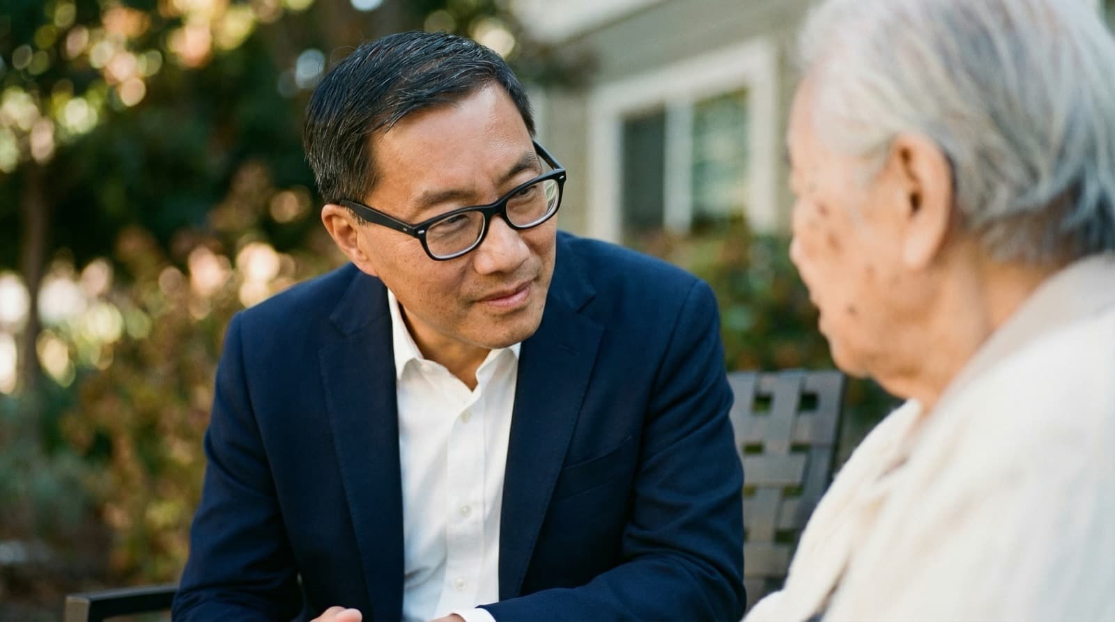 Fred Jung listening to community members